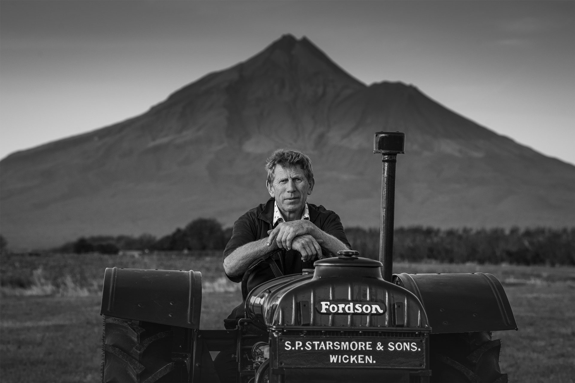 White-Wolf-Farmer-On-Old-Tractor-Professional-Photo-Portrait